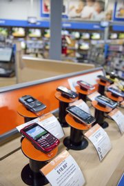 The new electronics departments of some Wal-Marts, like this one at Sixth and Wakarusa, are designed to be more interactive.