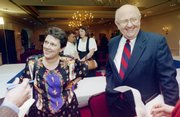 Chancellor Roberty Hemenway and his wife his wife, Leah, January 8, 1995, visit with members of media at the Adams Alumni Center.