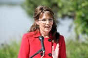 Alaska Gov. Sarah Palin announces that she is stepping down from her position as governor at her Lake Lucille home Friday.