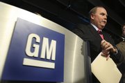 General Motors Corp. CEO Fritz Henderson addresses the media after a news conference at the company’s headquarters Friday in Detroit. Henderson announced on Friday that the company had emerged from bankruptcy protection far faster than anyone thought it could and will focus more on customers.