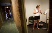 Kansas University junior Julia Snell, McPherson, practices in one of the rehearsal rooms at Murphy Hall. Fall 2009 will be the first semester for the School of Music, which was previously in the School of Fine Arts.
