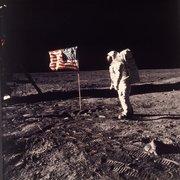 In this July 20, 1969, file photo, Astronaut Edwin E. “Buzz” Aldrin Jr. poses by a U.S. flag on the moon during the Apollo 11 mission.