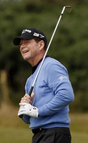 Tom Watson watches his shot from the first fairway during the final round of the British Open on Sunday in Turnberry, Scotland. The 59-year-old Watson finished second.