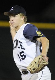 Lawrence Raiders batter Coulter Vestal grounds out to end the second inning against the Kansas Senators in the Legion Zone Three Tournament. The Raiders staged a two-run rally in the ninth inning and won, 3-2, on Thursday at Ice Field.