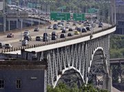 The Interstate-90 Innerbelt bridge is shown during rush hour Tuesday in Cleveland. Tens of thousands of the nation’s worst bridges must wait for repairs because states are spending stimulus money on better spans or on easier projects like repaving roads, an Associated Press analysis shows.