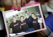 From left, Cary, Anderson and Embrey all got "chemo cuts," in May 2008 in support of Amy, second from right.