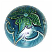 Orient & Flume started making paperweights in 1972 in Chico, Calif. This iridescent weight, made in 1978, sold at a Brunk auction in Asheville, N.C., for $208. It is 2 inches high.
