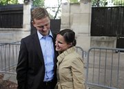 Assistant White House press secretary Tommy Vietor stands next to his new fiancee, Katie McCormick-Lelyveld, Michelle Obama’s chief spokeswoman.