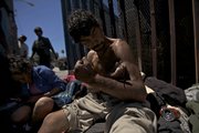 Victor Moreno, 40, a drug addict with a 20-year-old habit, shoots up Tuesday on a street corner near the international border in Tijuana, Mexico. Mexico now has some of the most liberal laws in the world for drug users after eliminating jail time for tiny amounts of marijuana, cocaine and even heroin, LSD and methamphetamine.