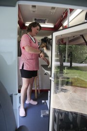 Szefc’s van has a heated bath, air conditioning, ventilation fans and organized, sterilized cutting equipment.