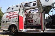 Customers say Barbara Szefc’s mobile dog-grooming station result in higher service costs but is worth the convenience.