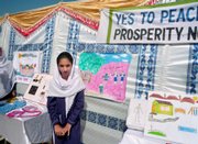 A Pakistani girl stands next to her painting during a painting contest at her school Saturday in Mingora, the main town of Pakistan’s troubled Swat Valley. The resumption of schools may be the most psychologically critical step yet for authorities trying to revive Swat. After all, destroying schools, girls’ schools especially, was a favorite Taliban activity.