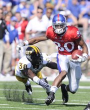 Kansas University’s Dezmon Briscoe (80) and Kerry Meier have combined to average 224.6 receiving yards per game. Only one other duo in the country has a better per-game average.
