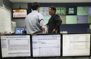 Employees of Korea Internet Security Center work July 8 inside a monitoring room in Seoul, South Korea. There is no kill switch for the Internet, no secret on-off button in an Oval Office drawer. Yet when Congress was exploring ways to secure computer networks, a plan to give the president the power to shut down Internet traffic to Web sites in an emergency set off alarms. Corporate leaders and privacy advocates protested the idea earlier this year, saying the government must not seize control.