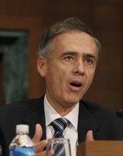 Associated Press President and Chief Executive Officer Tom Curley testifies Wednesday on Capitol Hill in Washington before the Senate Judiciary Committee hearing on government secrecy.