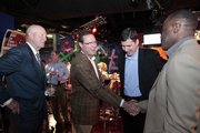 From left, Former Missouri coach Norm Stewart, Kansas coach Bill Self, UMKC coach Matt Brown and current MU coach Mike Anderson visit at the Coaches vs. Cancer Season Tipoff reception in this file photo from Oct. 6, 2009, at Sprint Center in Kansas City, Mo.