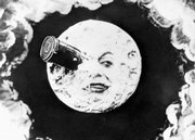 This still image from the 1902 silent film “Le Voyage Dans La Lune,” written and directed by Georges Méliès, shows “the man in the moon” with a bullet-shaped space capsule lodged in his eye. Today, NASA will deliberately crash two unmanned spacecraft into the moon in an attempt to find ice.