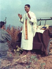 Father Emil Kapaun, a Catholic priest and Army chaplain, says Mass in the field during the Korean conflict in this undated photo released by the Catholic Diocese of Wichita. Kapaun, already under consideration for sainthood, has won the endorsement of the Army’s top civilian leader to receive the Medal of Honor.