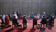 U.S. Secretary of State Hillary Rodham Clinton chats with Pakistani tribal leaders during her meeting with them Friday in Islamabad, Pakistan. Clinton came face-to-face Friday with Pakistani anger over U.S. aerial drone attacks in tribal areas along the Afghan border, a strategy that U.S. officials say has succeeded in killing key terrorist leaders.