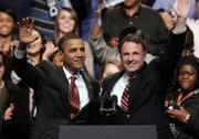 President Barack Obama and Virginia Democratic gubernatorial candidate Creigh Deeds wave to the crowd during a rally Oct. 27 in Norfolk, Va. Nervous Democrats are on the defense heading into 2010 and the midterm elections.