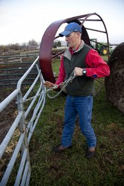 Tommy Hutchinson works on an area farm Tuesday morning. At age 27, Hutchinson, who served in the Navy Reserves in Iraq, is part of a new generation of military veterans.