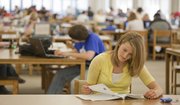 Kansas University student Stephanie Crawford studies at Anschutz Library. The Shawnee sophomore expects transition time going home for holidays, particularly because her family is renovating their house.