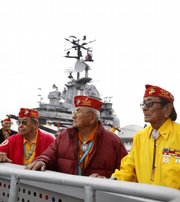 Navajo Code Talkers Joe Vandever, left, and Samuel Holiday look over the USS Intrepid Tuesday after a birthday celebration for the Marine Corps in New York. The young Navajo Marines, using secret Navajo language-encrypted military terms, helped the U.S. prevail at Iwo Jima and other World War II Pacific battles. The Code Talkers are in New York to march in the Veterans Day Parade and drum up support for a museum that will preserve their story.