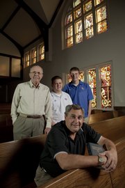 Tom Brady, front, has been pastor at Lawrence First United Methodist Church for more than three years. Brady is the sixth-generation pastor in his family after his father, Merris Brady (left). Brady’s sons, Scott (center) and Steve, are students at Kansas University.