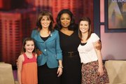 Talk show host Oprah Winfrey, second from right, is pictured with with former Republican vice presidential candidate Sarah Palin and her daughters, Piper, left, and Willow, right, during the taping of “The Oprah Winfrey Show” in Chicago in this photo taken last week. Palin appeared on the show Monday.