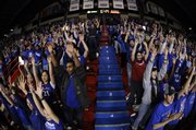 Kansas fans in the northern student section sing the Alma Mater before tipoff against Alcorn State during the first half, Wednesday, Dec. 2, 2009 at Allen Fieldhouse.