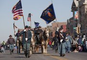 The Third Kansas Light Artillery during the 17th annual Lawrence Old-Fashioned Christmas Parade Saturday, Dec. 5.