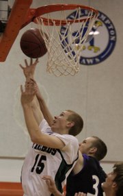Free State sophomore Brent Frantz (15) puts up a shot against Valley Center during the Metro Prep Classic. Frantz scored eight points as the Firebirds won, 54-46, on Friday in Bonner Springs.