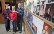 From left, Dana Laudick and her parents, Doris Bateson and LeRoy Bateson, pose in the foyer of the Eagles Lodge, 1803 W. Sixth St. Like other local fraternal organizations, the Eagles have seen dwindling participation as younger generations fail to refill the membership ranks.