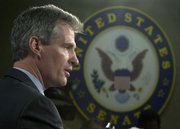 Sen. Scott Brown, R-Mass., speaks with reporters Thursday on Capitol Hill in Washington following his swearing in. He vowed to be an independent voice in a bitterly divided Senate. “I can’t promise I will be right in every vote I make. ... I will do the very best job I can,” Brown told reporters.