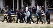 Two shooting victims are taken Friday from the Shelby Center on the campus of the University of Alabama to an ambulance after multiple people were shot in Huntsville, Ala Officials at the University of Alabama’s Huntsville campus say three people were killed and three injured in a campus shooting.