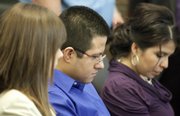 Israel Mireles sits in a Butler County courtroom on Friday in El Dorado. Jurors deliberated just more than an hour before convicting Mireles, 26, in the death of Emily Sander. The Butler Community College student was also known as Internet porn model Zoey Zane.