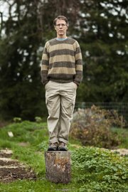 Kim Stanley Robinson poses near his home in Davis, Calif. His latest novel, “Galileo’s Dream,” delves into concepts of alternate futures.