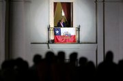 Chile’s President Sebastian Pinera speaks to supporters Thursday from a balcony at La Moneda presidential palace in Santiago, Chile. Pinera was sworn in as president Thursday at the National Congress in Valparaiso.