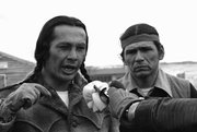 Russell Means, left, and Dennis Banks, speak to reporters during the 1973 American Indian Movement standoff at the Pine Ridge Reservation in South Dakota. Means hopes to make a film of this historic event called "Wounded Knee 1973."