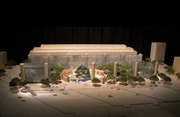 This artist’s rendering provided by the Eisenhower Commission shows a model for the national memorial in Washington for President Dwight D. Eisenhower. The proposal by renowned architect Frank Gehry features a series of 80-foot-tall columns and metal “tapestries.” The commission is aiming to finish it by 2015.