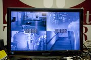 A monitor displays the feeds from various cameras that the WPRS has wired up throughout the Lawrence Community Theatre.