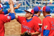 KU pitcher Colton Murray (45) is congratulated by teammates after pitching out of a jam late in the game on Saturday, April 3, 2010. The Jayhawks tied the Aggies 8-8 after 11 innings.