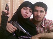 This undated picture provided Friday by the Russian news agency NewsTeam shows, according to the Russian newspaper Kommersant, Dzhennet Abdurakhmanova, left, and her husband, Umalat Magomedov. Kommersant said Friday that one of the Moscow subway suicide bombers was Abdurakhmanova, the 17-year-old widow of Magomedov, an Islamist rebel from the North Caucasus killed by Russian government forces in December 2009.