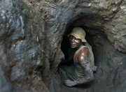 A man enters a tunnel dug with shovels April 10, 2004, in the Shinkolobwe cobalt mine in the Democratic Republic of Congo. U.N. Security Council Resolution 1540 of 2004 obligates governments to give a full accounting of their nuclear materials, but as President Barack Obama is host to a summit on nuclear security April 12-13 in Washington, many states have fallen short of the reporting deadline, including Congo, the source of the uranium for the first atomic bomb.