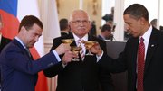 President Barack Obama, with Russian President Dmitry Medvedev, left, and Czech Republic President Vaclav Klaus, share a toast Thursday in Prague after signing the nuclear arms treaty. Obama is hoping for Senate approval of the deal by year’s end.