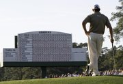 Lee Westwood waits to putt on the 17th green. Westwood shot a 68 on Saturday at Augusta, Ga., and has a one-shot lead going into the final round of the Masters.