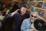 “Record Store Days: From Vinyl to Digital and Back Again” co-authors Phil Gallo, left, and Gary Calamar visit Freakbeat Records in Los Angeles.