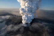 This aerial image shows the crater spewing ash and plumes of grit Saturday at the summit of the volcano in southern Iceland’s Eyjafjallajokull glacier. A lingering volcanic ash plume forced extended no-fly restrictions over much of Europe on Saturday, as Icelandic scientists warned that volcanic activity had increased and showed no sign of abating — a portent of more travel chaos to come.