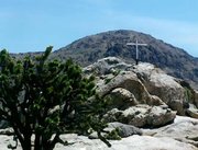 This undated photo taken by Henry and Wanda Sandoz shows the memorial known as the Mojave Cross on an outcrop known as Sunrise Rock in California’s Mojave National Preserve.