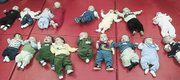 More than a dozen babies attended a birthday party for children born between September and December at Memorial Medical Center of West Michigan, Ludington, Mich., in this Feb. 16, 2002, file photo. New mothers in the U.S. are increasingly older and better educated than they were two decades ago, according to a study released Thursday.